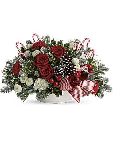 A Jolly Candy Cane bouquet with flowers, candies and ribbon