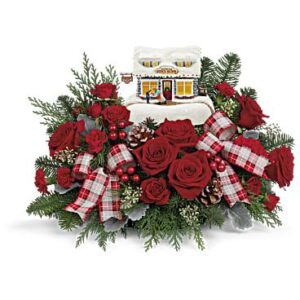 A Jolly Candy Cane bouquet with flowers and ribbon