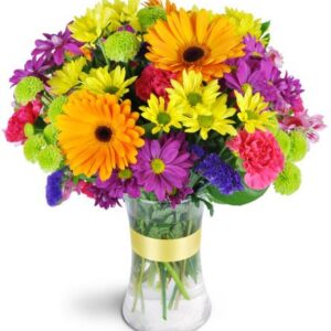 Rainbow colored flowers with leaves in a glass jar