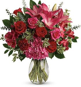 Bouquet of red and pink flowers.